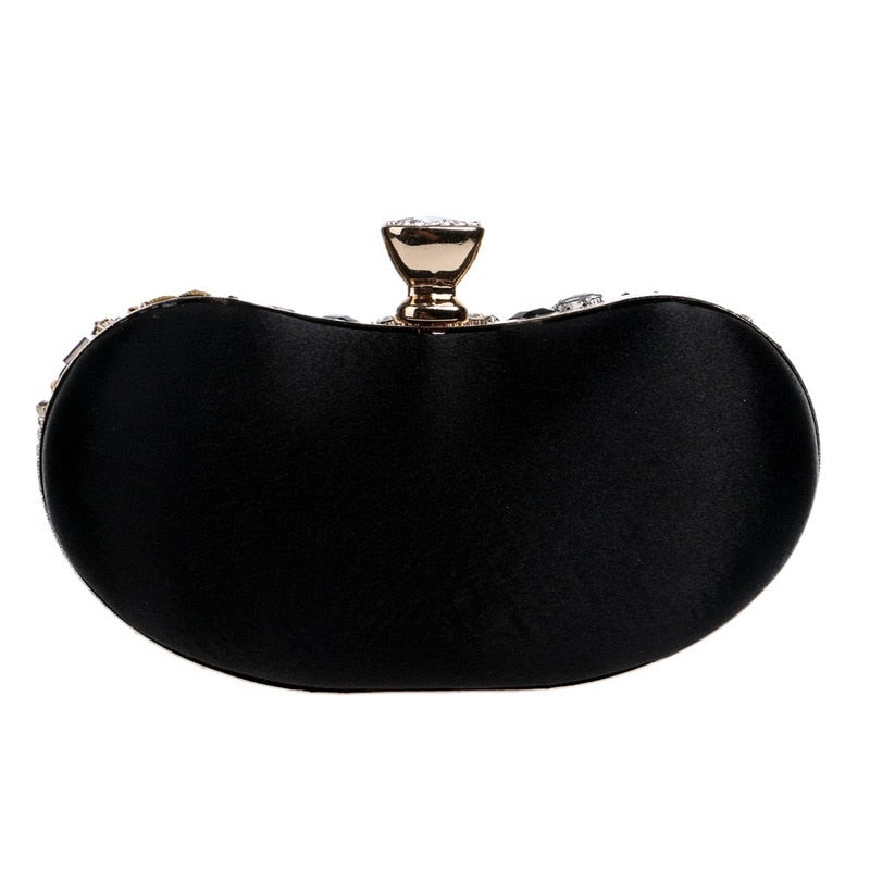 Elegant small black beaded clutch purse with metal chain strap, perfect for evening events and weddings.