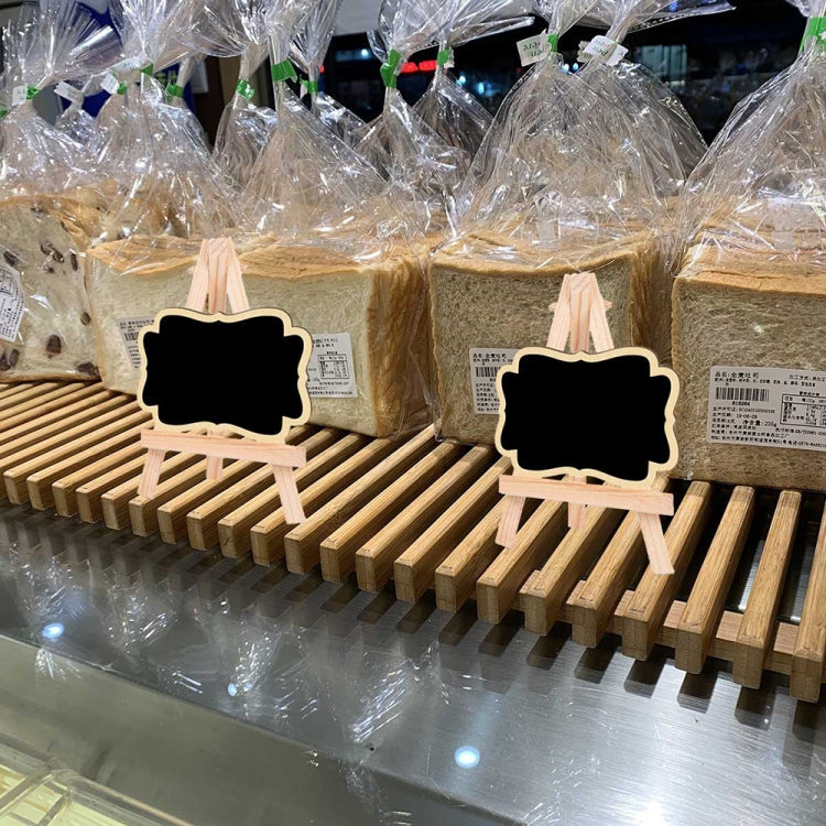 Small Party Shop Message Blackboard Ornaments made of pine wood, featuring various shapes like rectangle, house, and flower, displayed on a tripod.