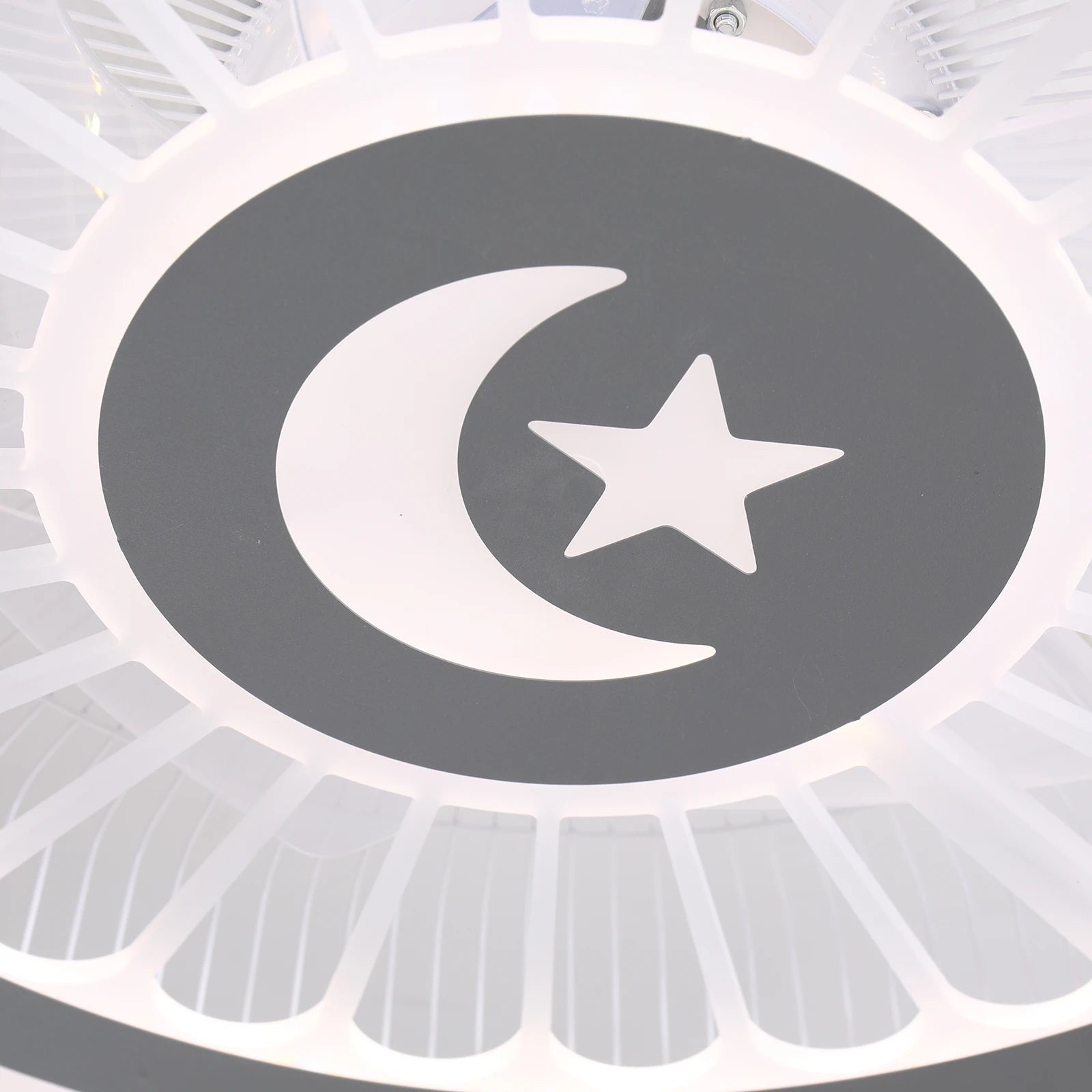 Smart ceiling fan with LED lights and remote control, designed for modern bedroom decor.