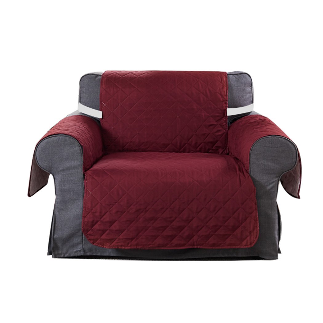 Waterproof quilted sofa cover in wine color, designed for protection and style, featuring delicate edges and anti-slip backing.