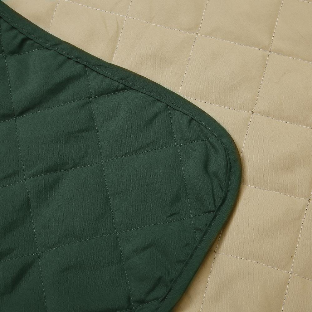 Waterproof quilted sofa cover in coffee color, designed for protection and style, featuring delicate edges and anti-slip backing.