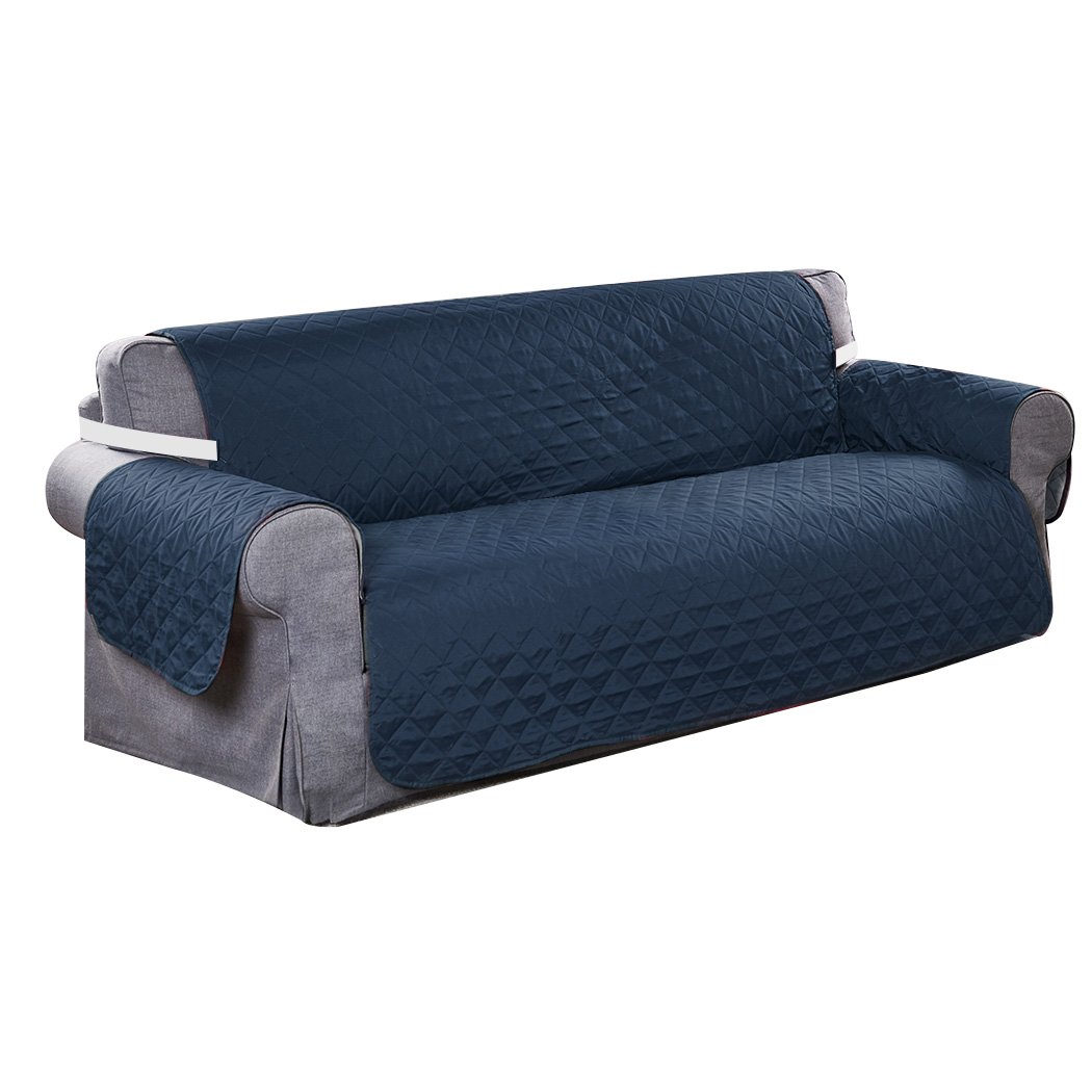 Teal quilted sofa cover protector, showcasing elegant design and waterproof features, perfect for home use.