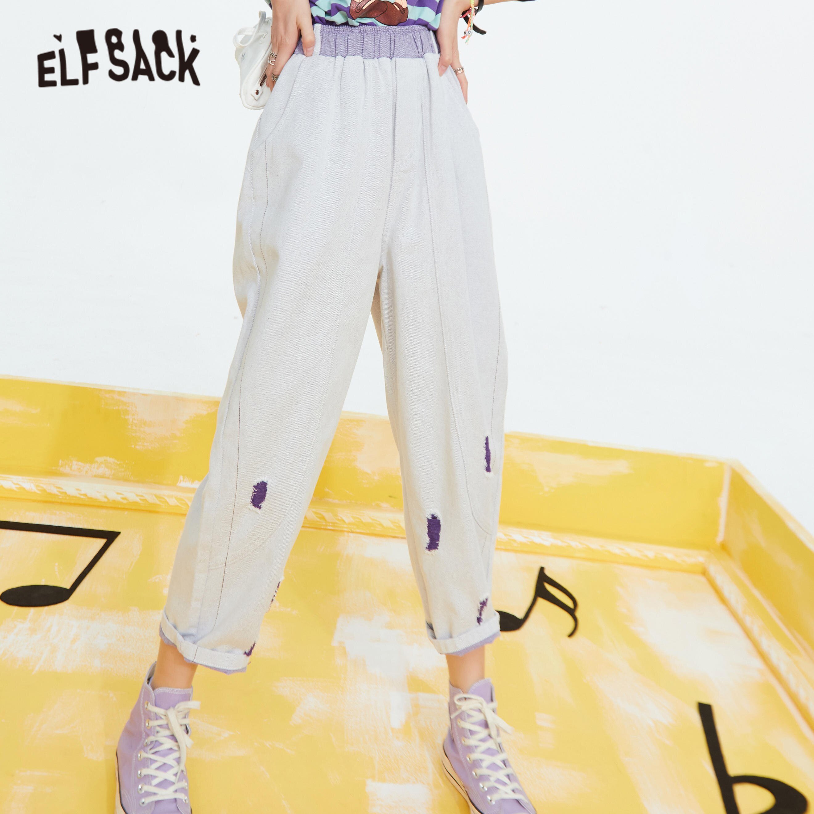 Solid high waist washed casual harem jeans for women in pure purple, featuring a relaxed fit and ankle-length design.