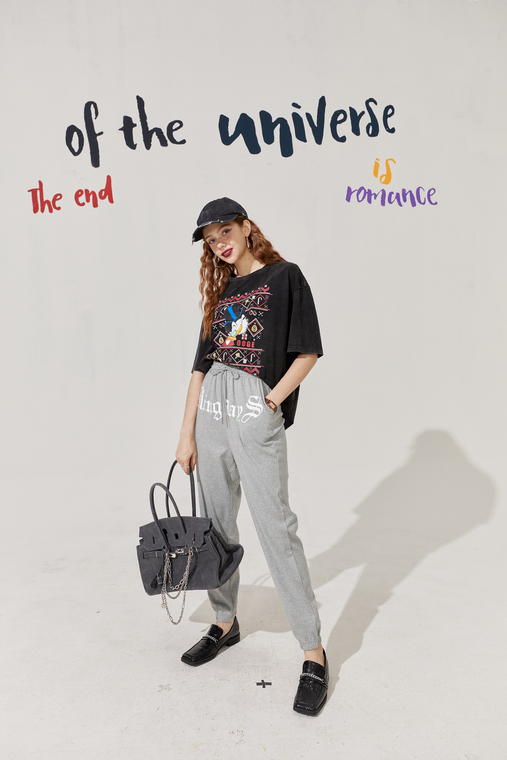 Solid Letter High Waist Straight Casual Women Harem Trouser in a stylish autumn setting, showcasing its high waist and comfortable fit.