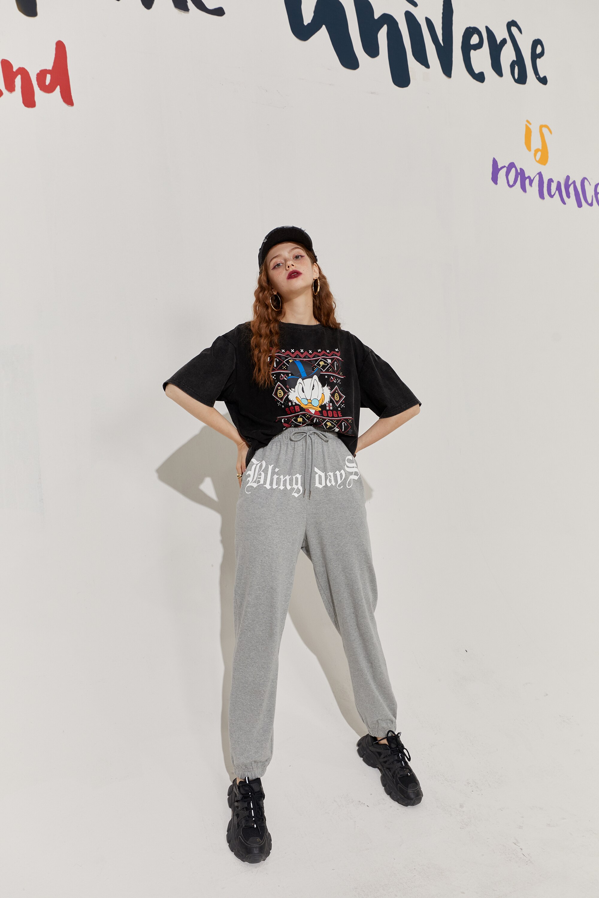 Solid Letter High Waist Straight Casual Women Harem Trouser in a stylish autumn setting, showcasing its high waist and comfortable fit.