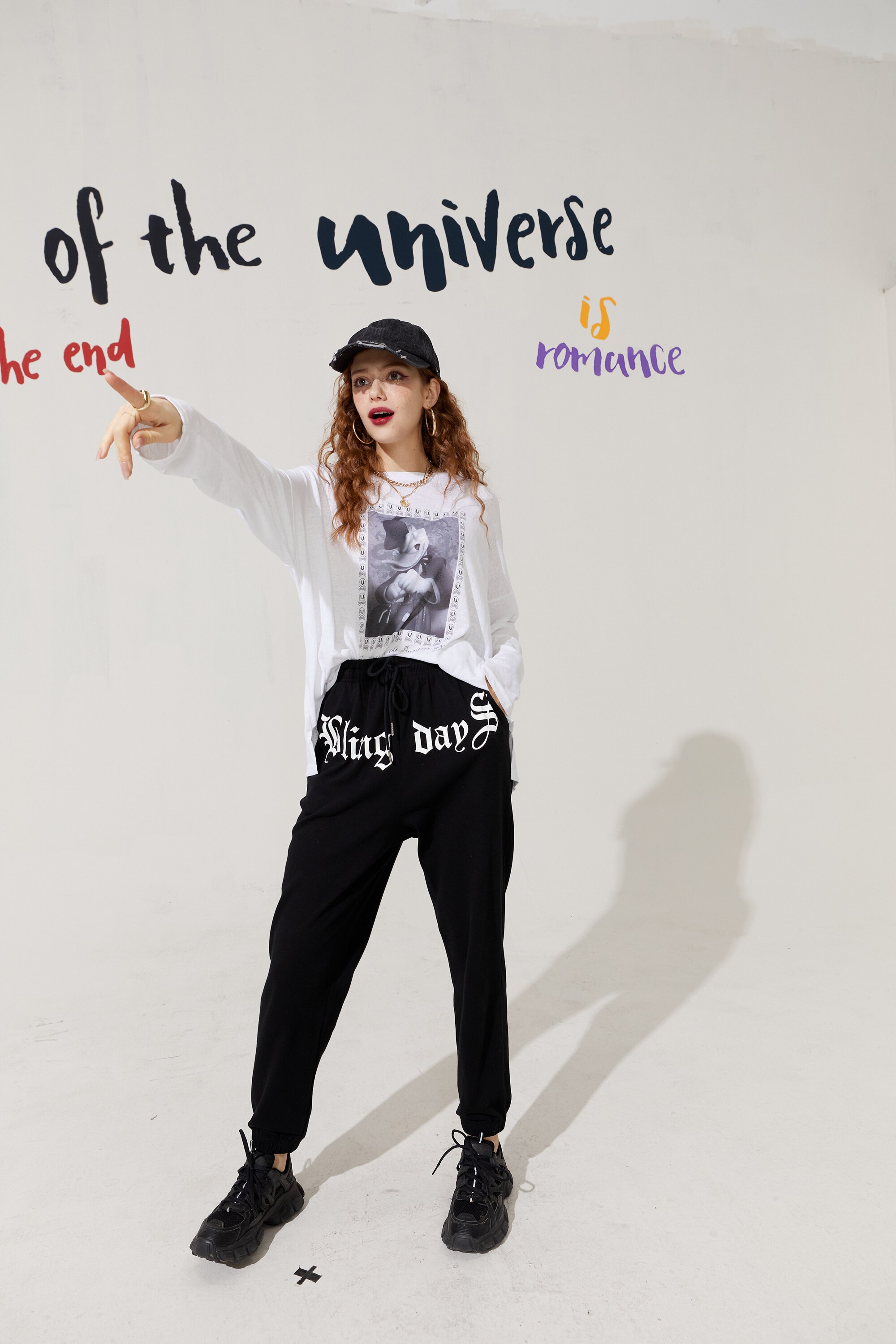 Solid Letter High Waist Straight Casual Women Harem Trouser in a stylish autumn setting, showcasing its high waist and comfortable fit.