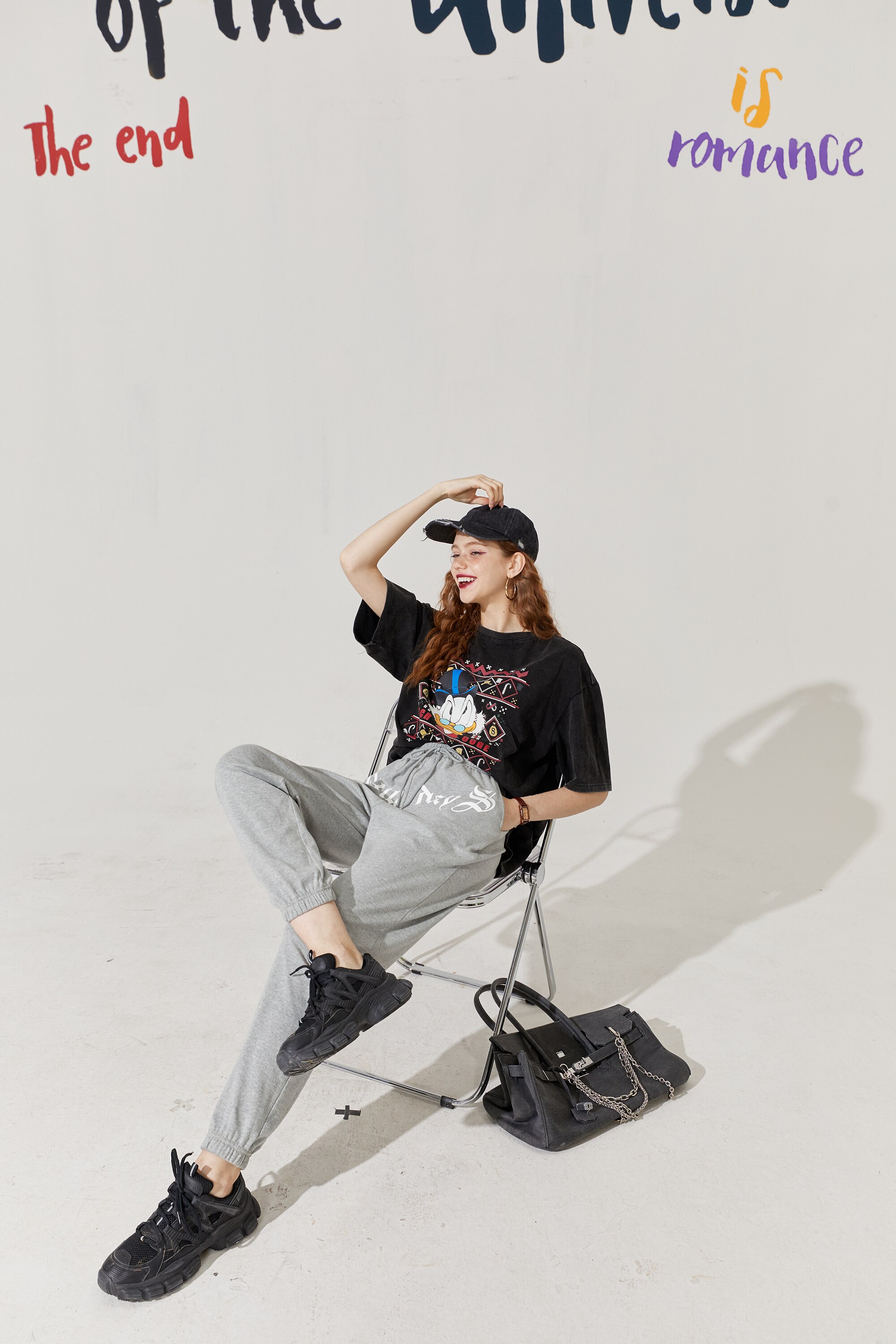 Solid Letter High Waist Straight Casual Women Harem Trouser in a stylish autumn setting, showcasing its high waist and comfortable fit.