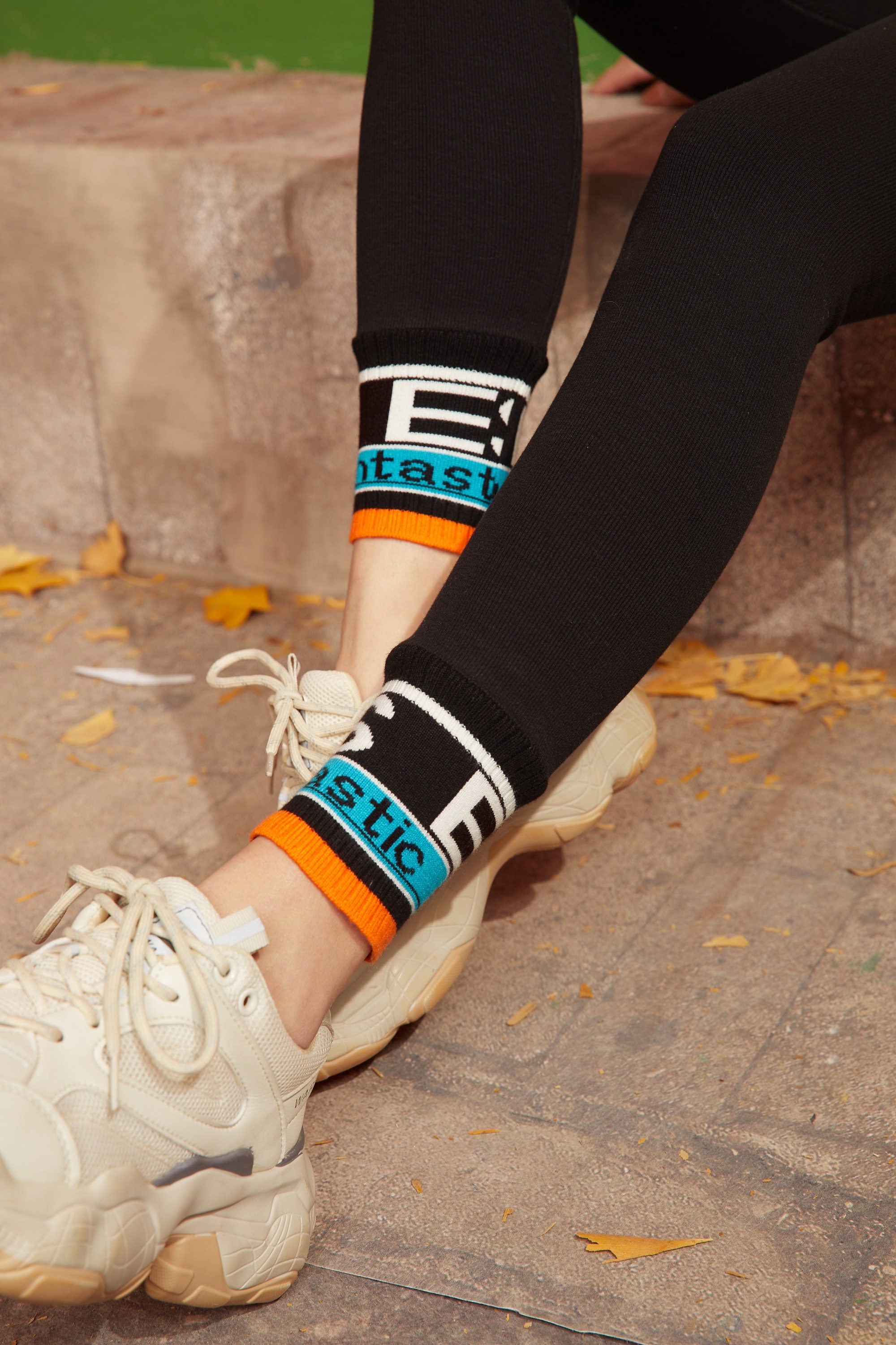 Solid Letter Print Minimalist Skinny Women Legging Pants in black and gray, featuring a high elastic waist and a sleek skinny fit.