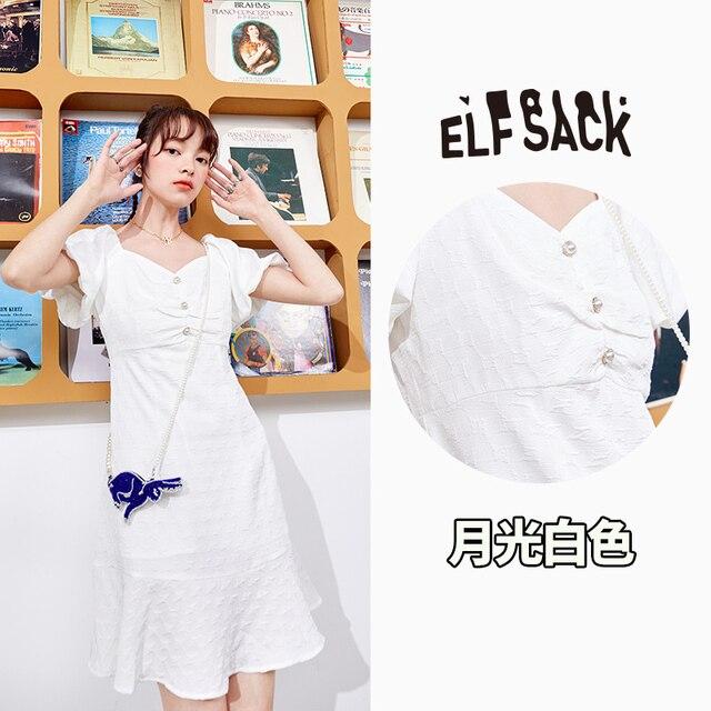 A stylish Solid Pure Casual Chic Button Party Dress for women featuring a backless design and puff sleeves, available in black and white.