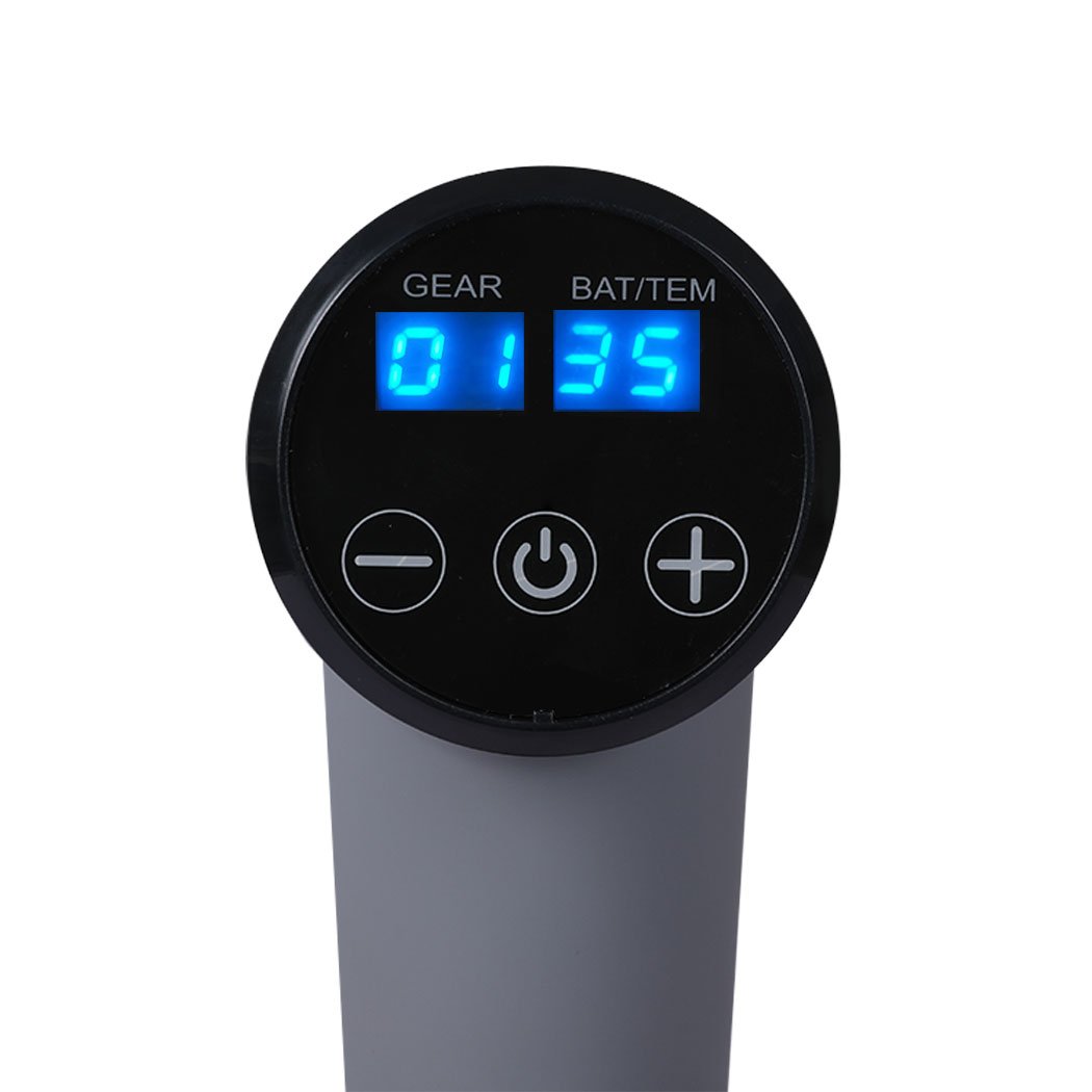 Spector Heated Massage Gun with multiple massage heads and sleek design, ideal for deep tissue muscle relief.