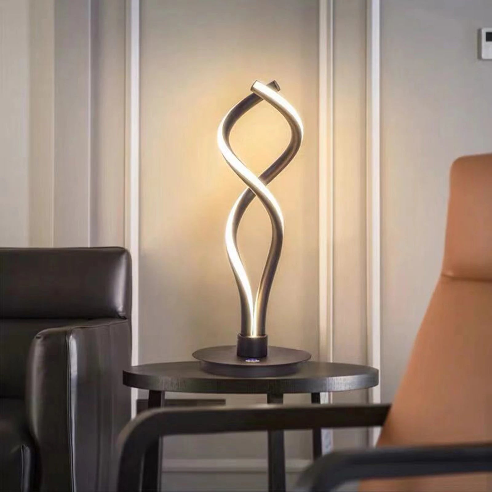 Modern Minimalist LED Spiral Table Lamp with a sleek black finish, designed for bedside or desk use, showcasing its unique spiral shape.