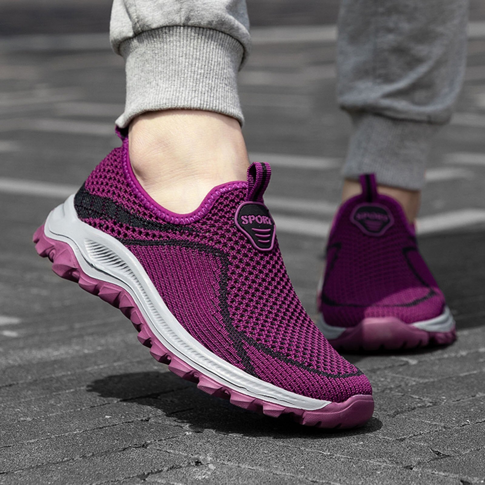 A pair of stylish women's sports shoes featuring a breathable canvas upper, pointed toe design, and animal print pattern, perfect for casual summer wear.