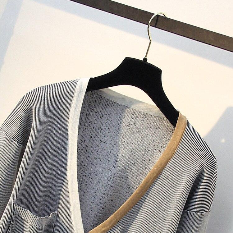 Spring Autumn Women Sweater featuring contrast color stripes and a V-neck collar, designed for a stylish and comfortable fit.