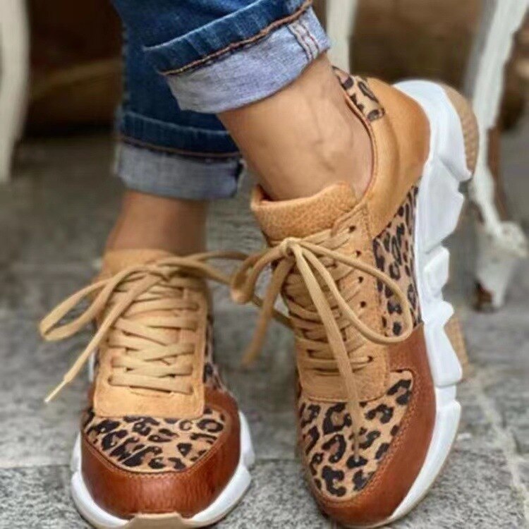 Spring Trendy Sneaker for Women featuring a stylish leopard print design, lace-up closure, and durable rubber sole.