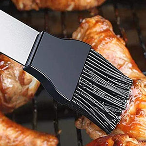 A complete set of stainless steel BBQ tools including spatula, tongs, fork, and skewers, neatly organized in a portable handbag.