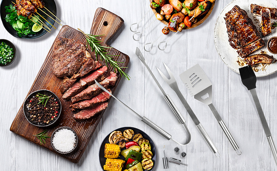 A complete set of stainless steel BBQ tools including spatula, tongs, fork, and skewers, neatly organized in a portable handbag.