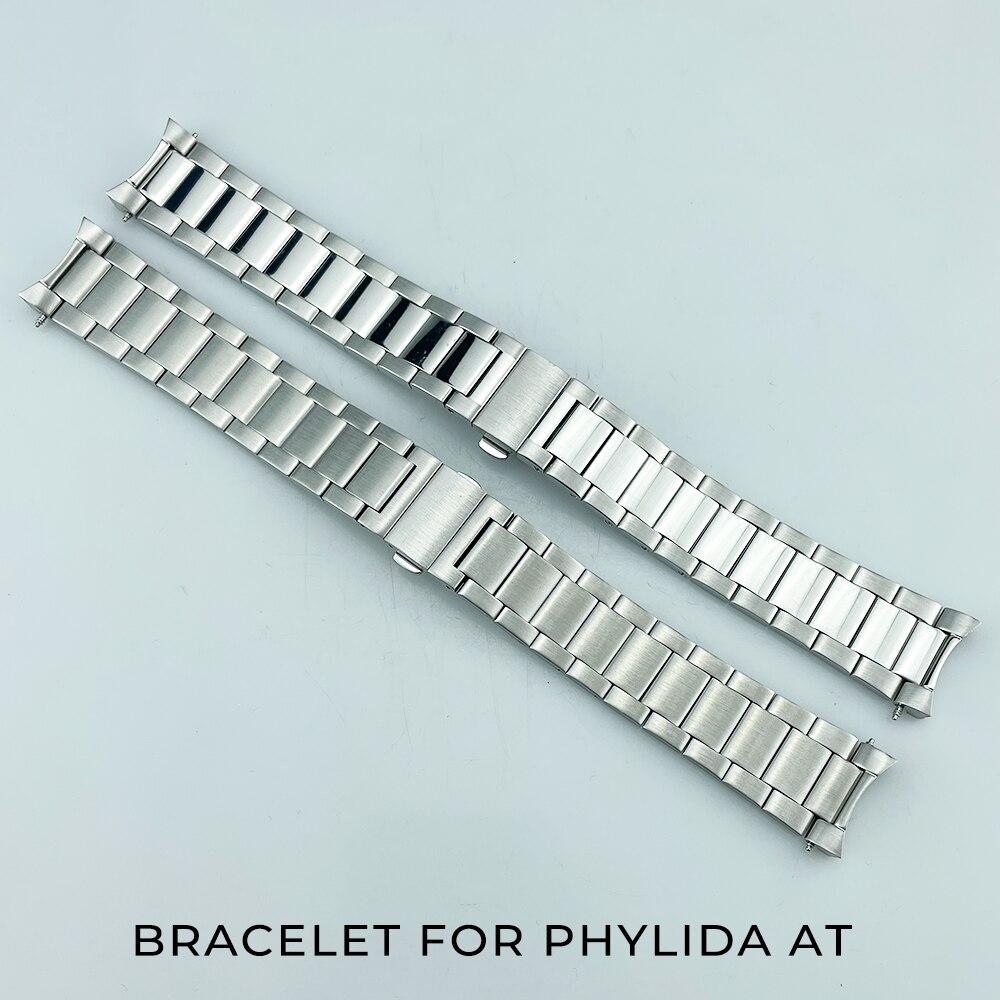A sleek stainless steel bracelet designed for AT watches, featuring a polished finish and double push clasp for secure wear.