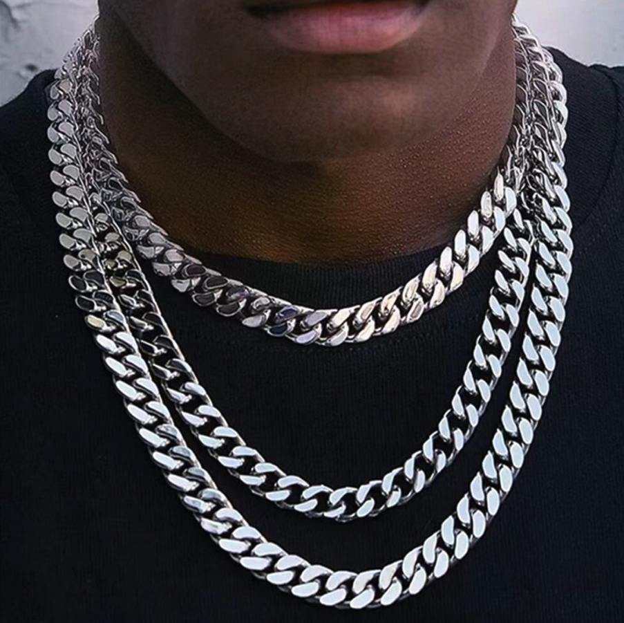Stainless Steel Gold Silver Chain Cuban Curb Necklace displayed elegantly, showcasing its shiny links and durable clasp.