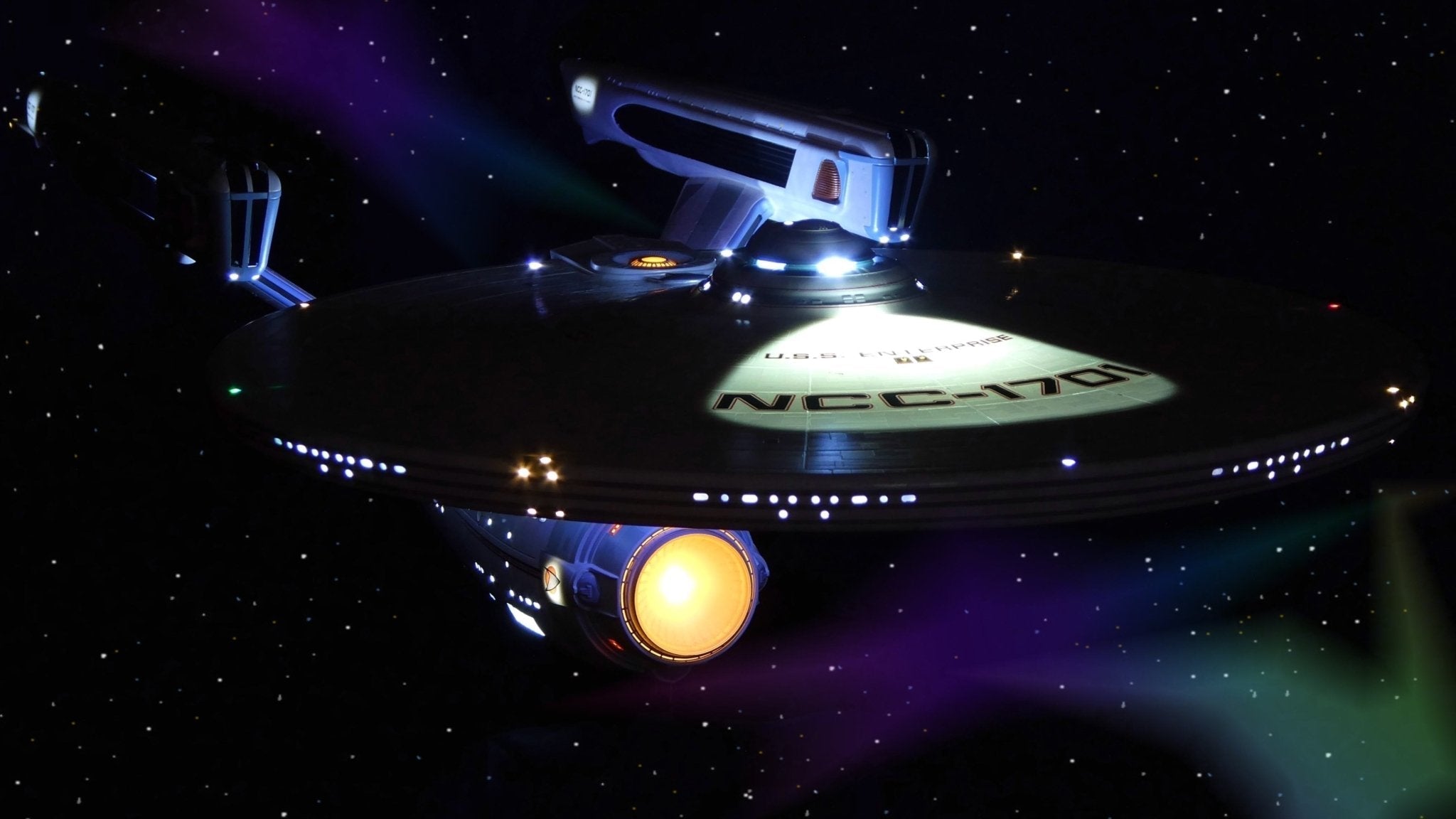 Star Trek USS Enterprise Refit model kit with lighting and sound effects, showcasing intricate details and vibrant LED lights.