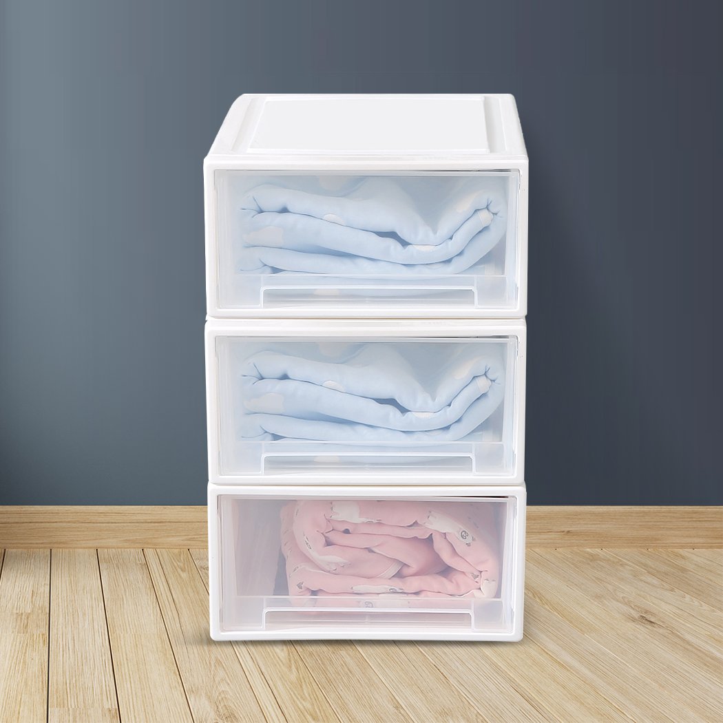 A set of four transparent storage drawers made of durable polypropylene plastic, featuring smooth sliding doors and integrated handles for easy access.