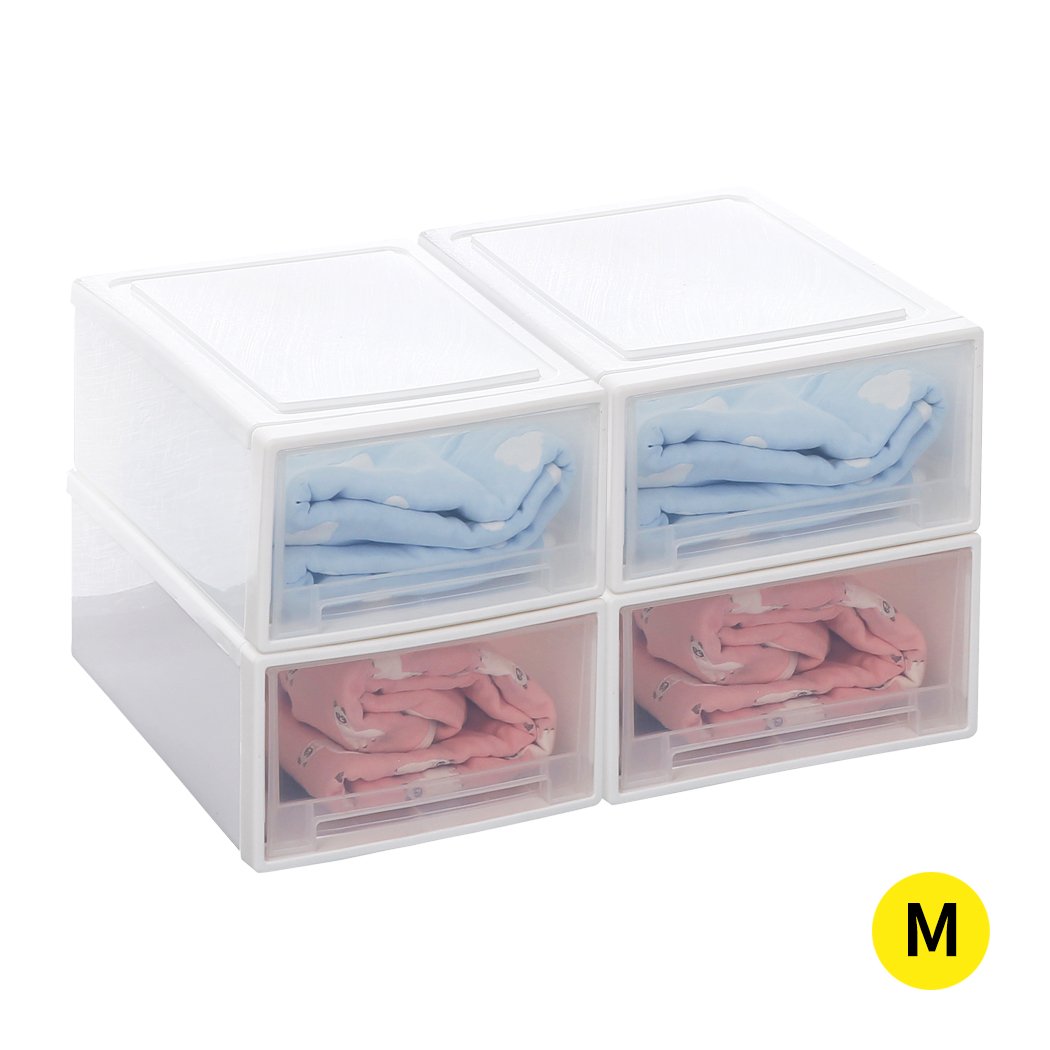 A set of four transparent storage drawers stacked together, showcasing their sleek design and integrated handles for easy access.