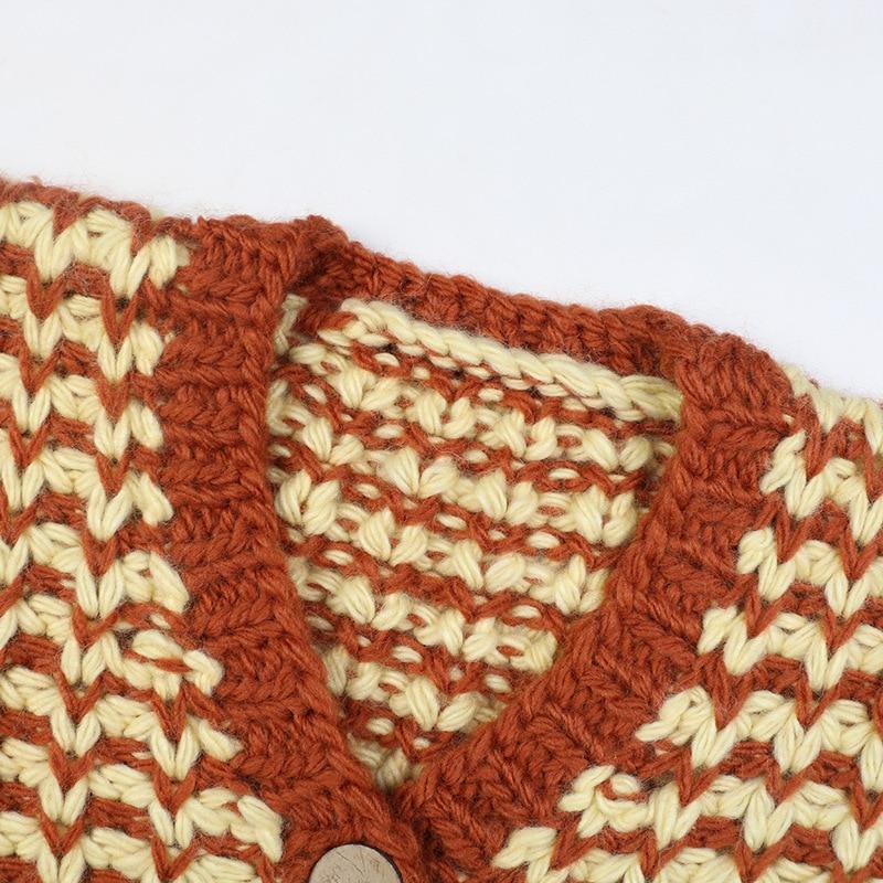 A stylish striped cardigan sweater for women featuring lantern sleeves and a V-neck, perfect for casual autumn and winter wear.