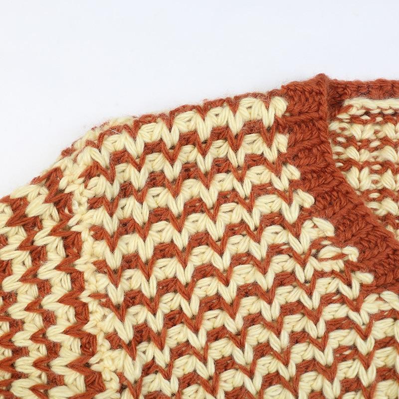 A stylish striped cardigan sweater for women featuring lantern sleeves and a V-neck, perfect for casual autumn and winter wear.