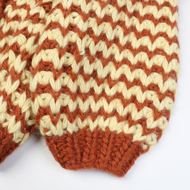 A stylish striped cardigan sweater for women featuring lantern sleeves and a V-neck, perfect for casual autumn and winter wear.