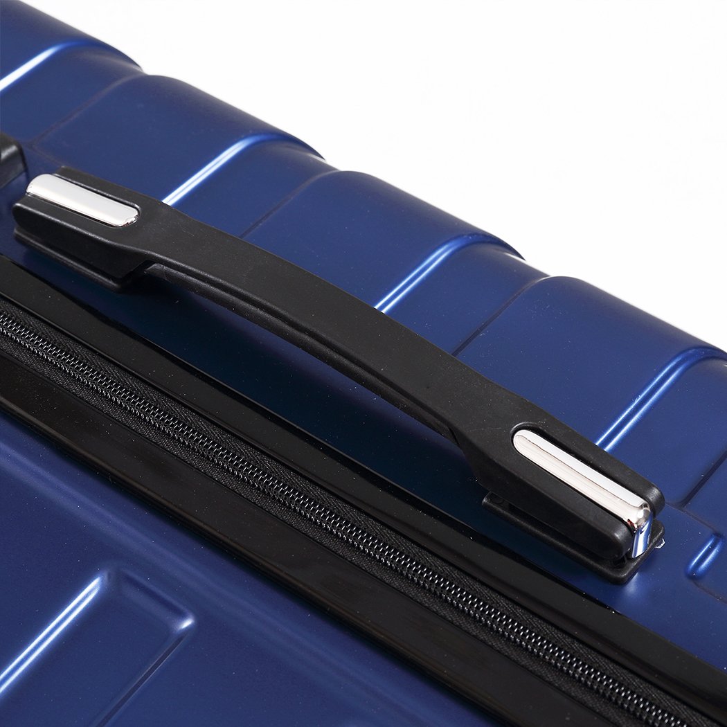 Three-piece suitcase luggage set in navy color, showcasing hard cover design and dual wheels for easy travel.