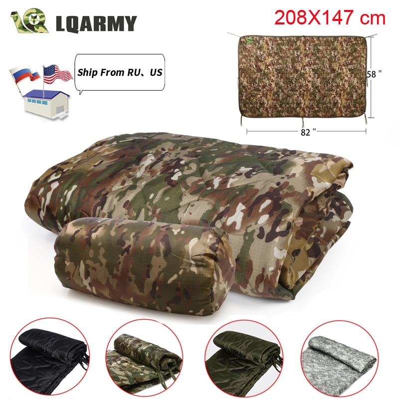 Tactical Army Poncho Liner in camouflage pattern, showcasing its water-repellent fabric and quilted design, ideal for outdoor activities.