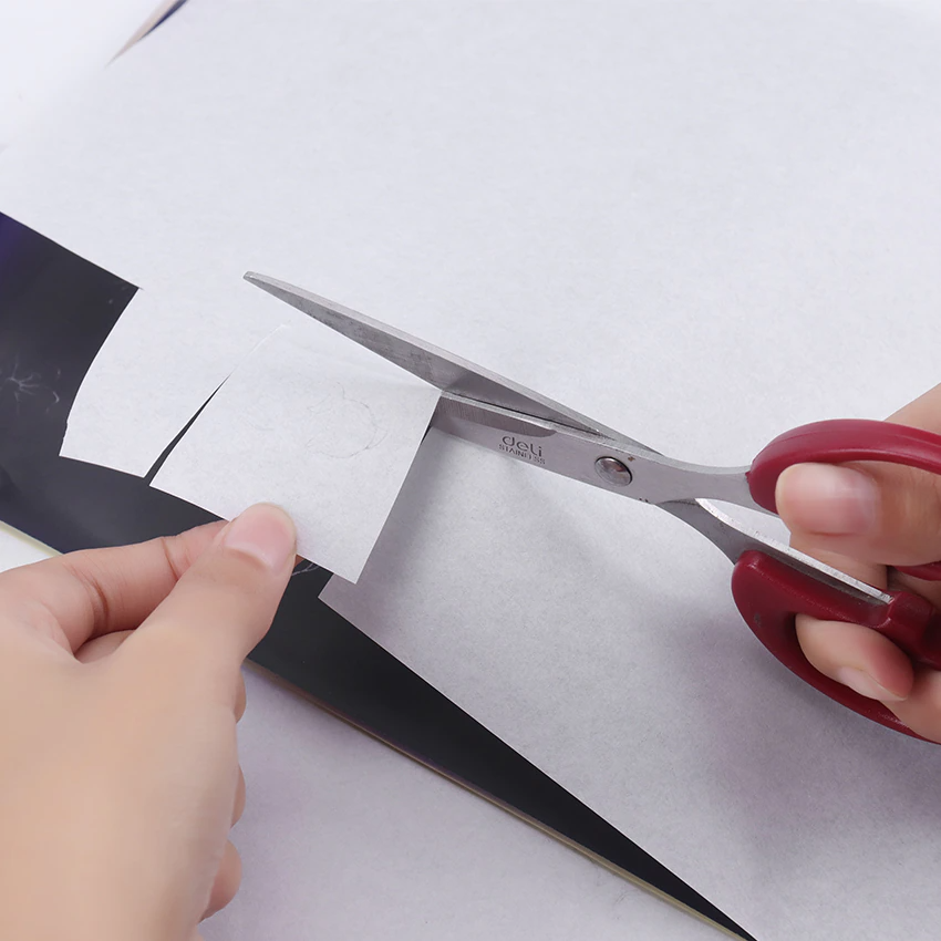 Tattoo Transfer Paper Stencil Carbon Thermal Tracing Hectograph Supplies Sheets displayed on a white background, showcasing its layers and size.