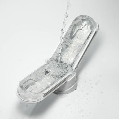 Tenga Flip Zero Gravity White male masturbator with a sleek design and clear case for hygienic storage.