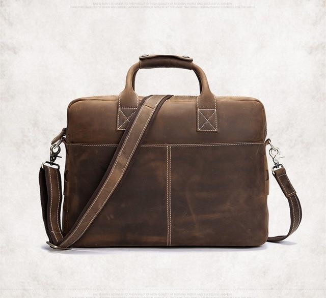 The Welch Briefcase, a vintage leather messenger bag, showcasing high-quality crazy horse leather with adjustable straps and a stylish design.