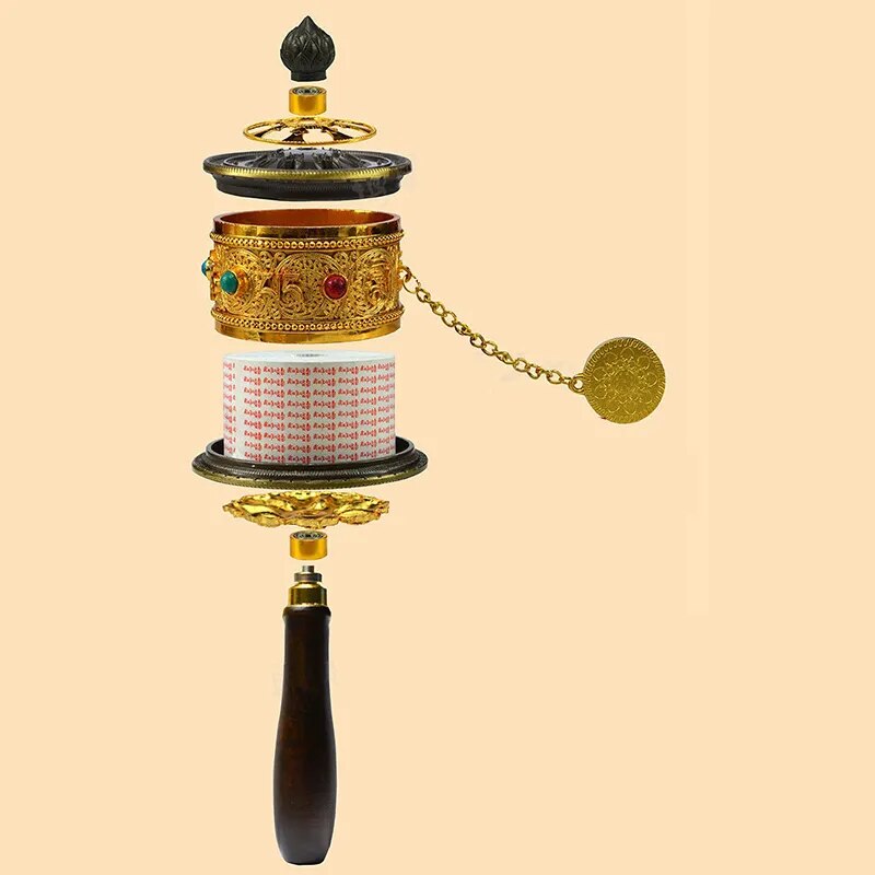 Tibetan Special Crafts Prayer Wheel made of alloy metal, featuring intricate carvings and available in gold, silver, and copper colors.