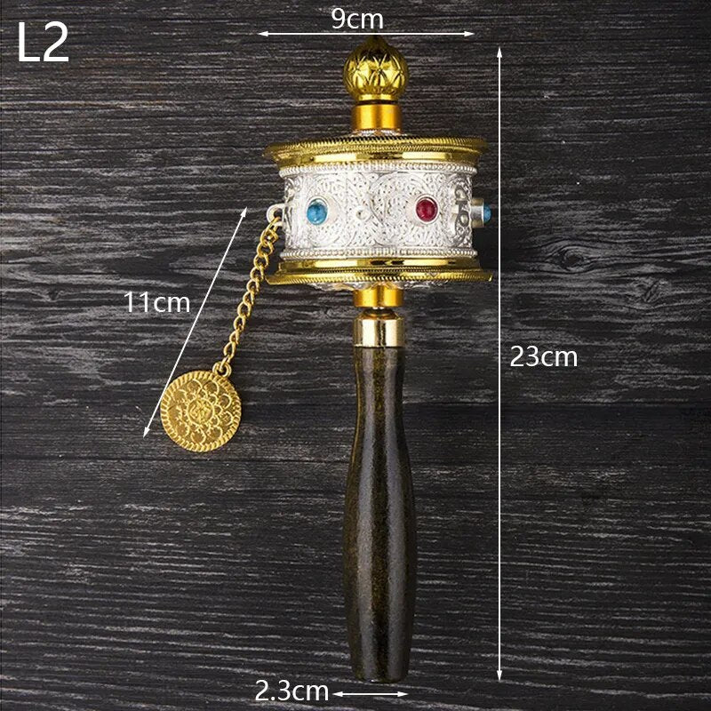 Tibetan Special Crafts Prayer Wheel made of alloy metal, featuring intricate carvings and available in gold, silver, and copper colors.