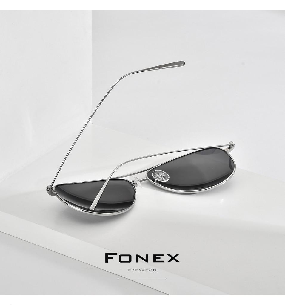 A pair of men's titanium polarized aviator sunglasses with UV400 protection, featuring a sleek design and lightweight frame.