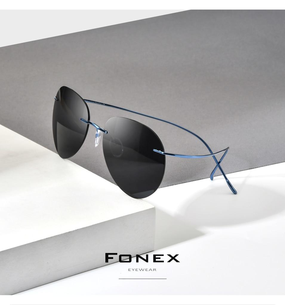 A pair of stylish titanium rimless sunglasses for men, featuring a frameless design and polarized lenses, perfect for outdoor activities.