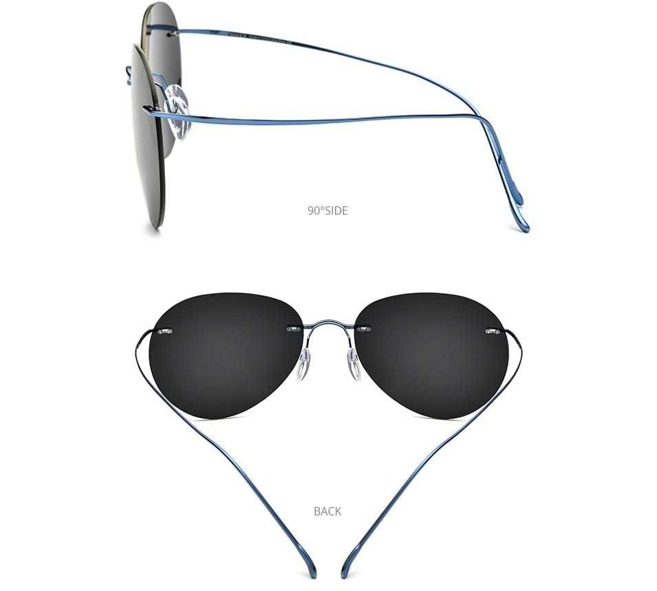 A pair of stylish titanium rimless sunglasses for men, featuring a frameless design and polarized lenses, perfect for outdoor activities.