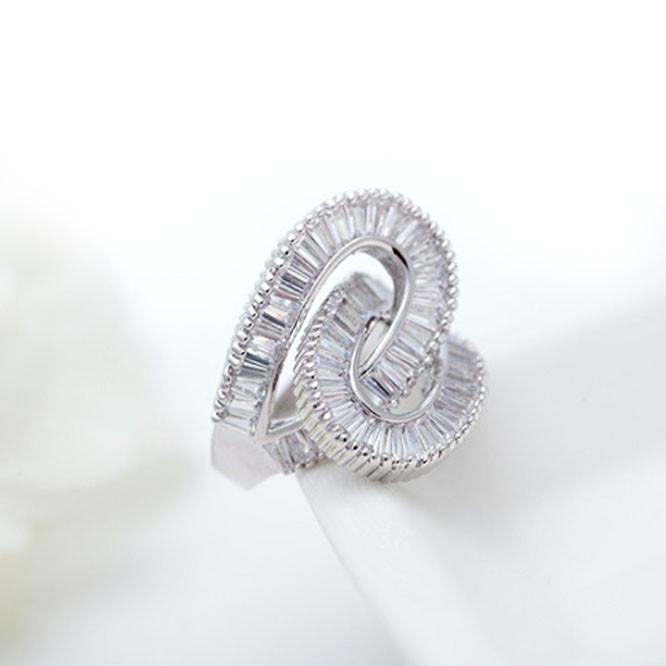 Together Forever Baguette Ring featuring two entwining infinity loops, symbolizing eternal love and commitment, elegantly designed with silver plating.