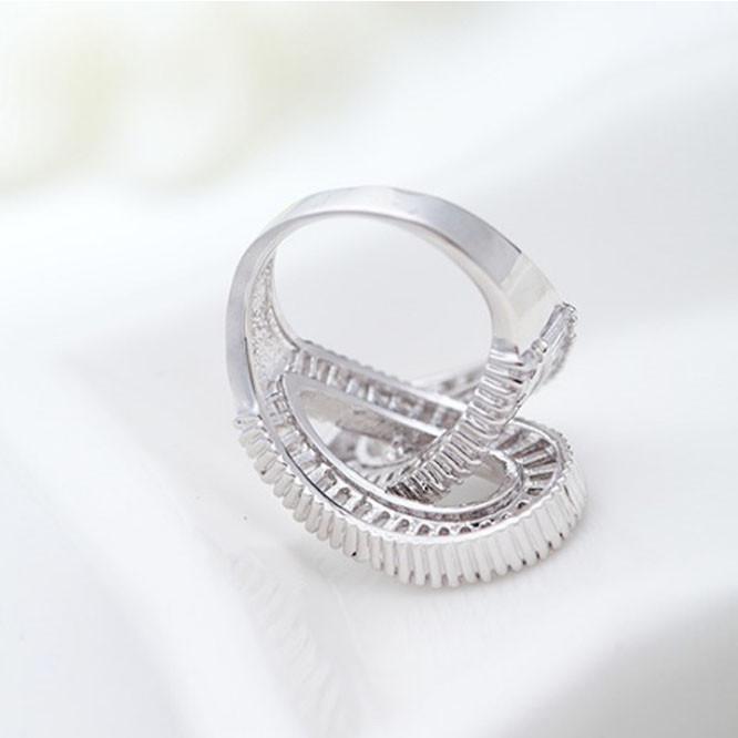 Together Forever Baguette Ring featuring two entwining infinity loops, symbolizing eternal love and commitment, elegantly designed with silver plating.