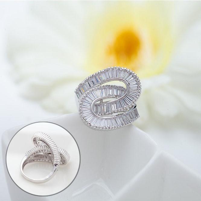 Together Forever Baguette Ring featuring two entwining infinity loops, symbolizing eternal love and commitment, elegantly designed with silver plating.