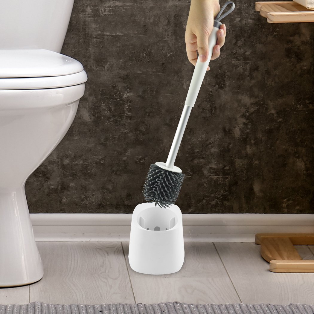 Toilet brush with holder featuring soft bristles and a stylish design, ideal for effective bathroom cleaning.