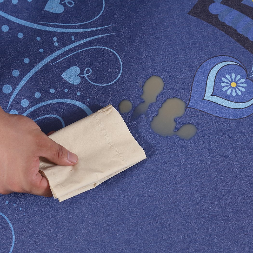 Eco-friendly TPE yoga mat with dual layer and non-slip surface, featuring traditional design and bonus carry bag for easy transport.