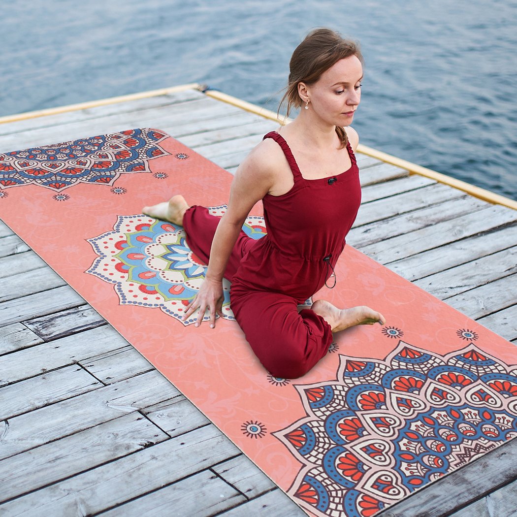Eco-friendly TPE yoga mat with dual-layer non-slip design, featuring a traditional engraved pattern and a bonus carry bag.