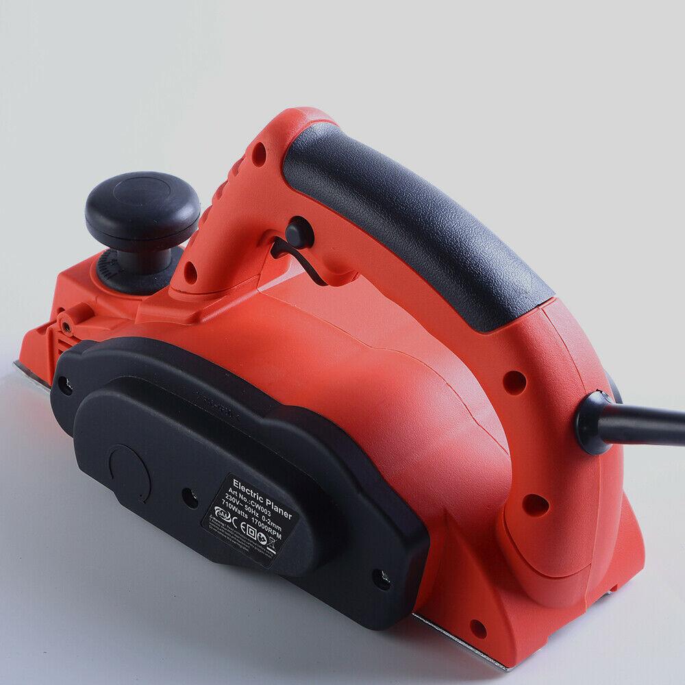 Traderight 710W Electric Wood Planer with two blades, showcasing its ergonomic design and adjustable depth settings.