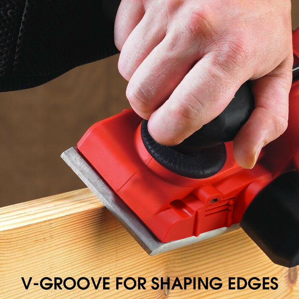 Traderight 710W Electric Wood Planer with two blades, showcasing its ergonomic design and adjustable depth settings.