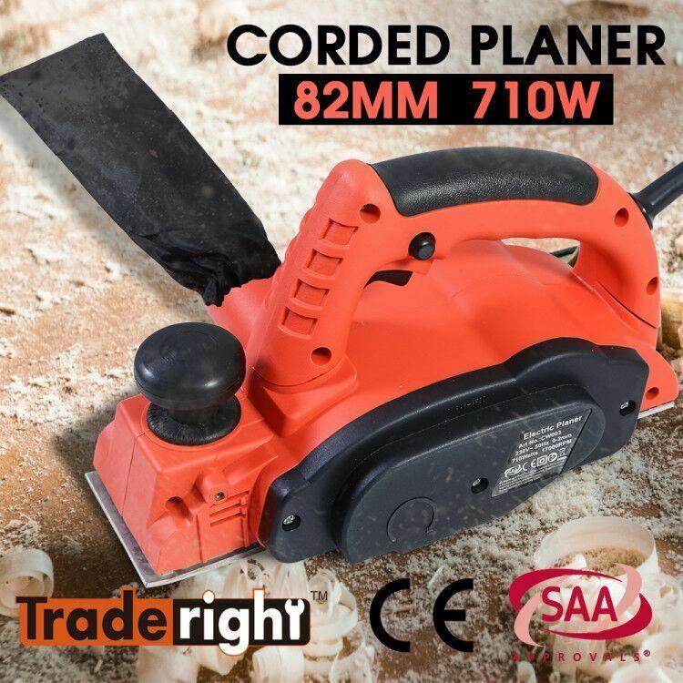 Traderight 710W Electric Wood Planer with two blades, showcasing its ergonomic design and adjustable depth settings.