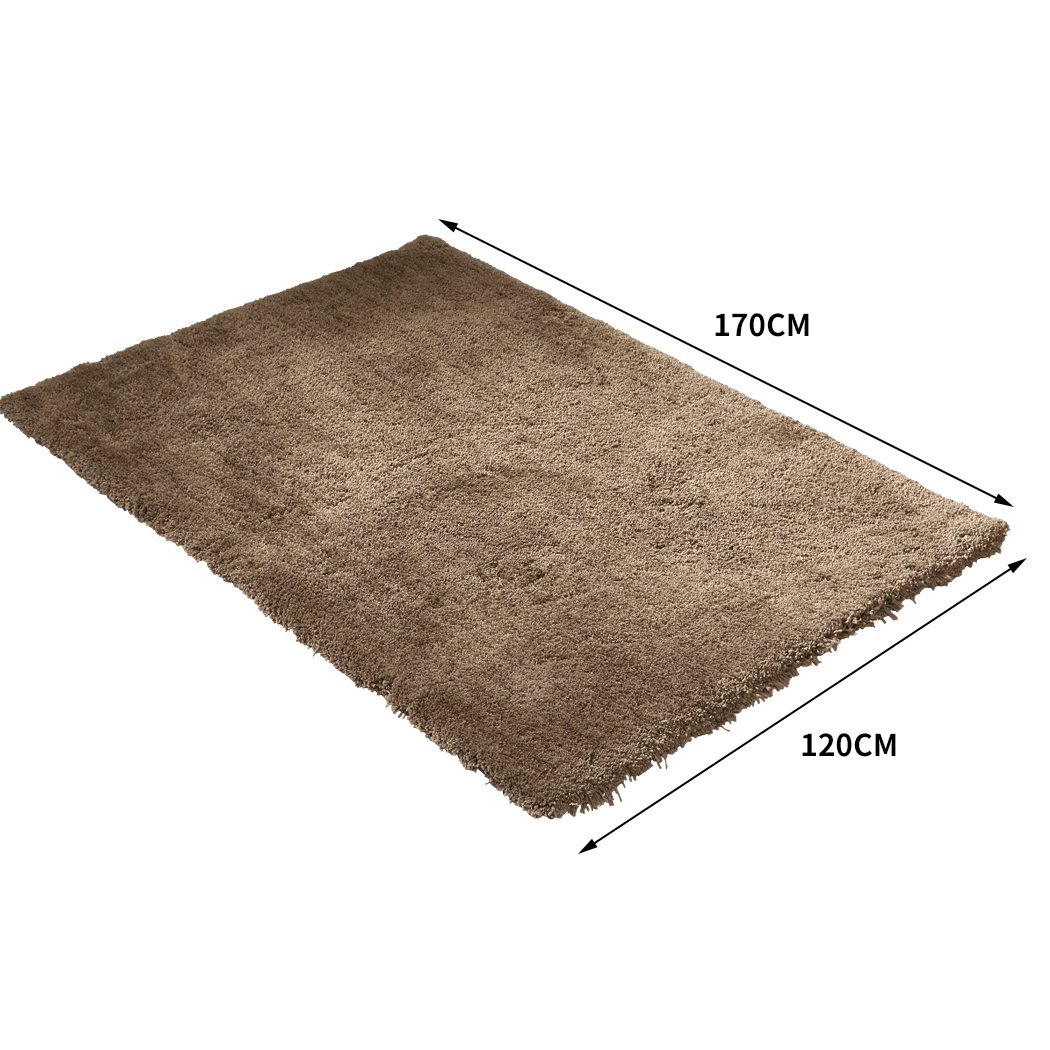 Ultra Soft Anti Slip Rectangle Plush Shaggy Floor Rug in a cozy living room setting, showcasing its thick pile and non-slip backing.
