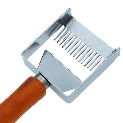 Uncapping Fork Iron Honeycomb Honey Scraper with Wooden Handle, designed for efficient honey extraction in beekeeping.