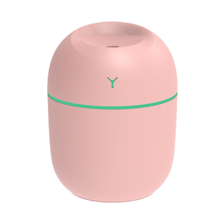 USB Mini Desktop Colorful Night Light Car Humidifier with a 250ml water tank, showcasing its compact design and colorful ambient light.